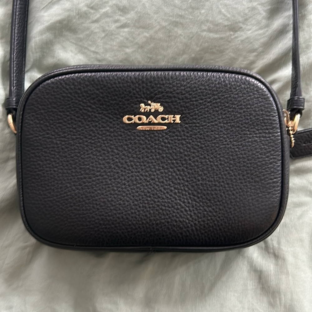 Black Coach crossbody never been worn with crossbody strap
